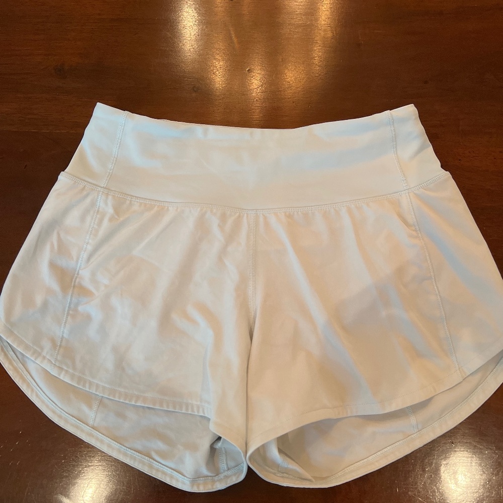 Speed Up Mid Rise lined 4” shorts